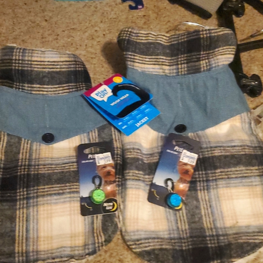 New With Tags Dog Lights, As well as Doggy fleece lined flannels. One is a size